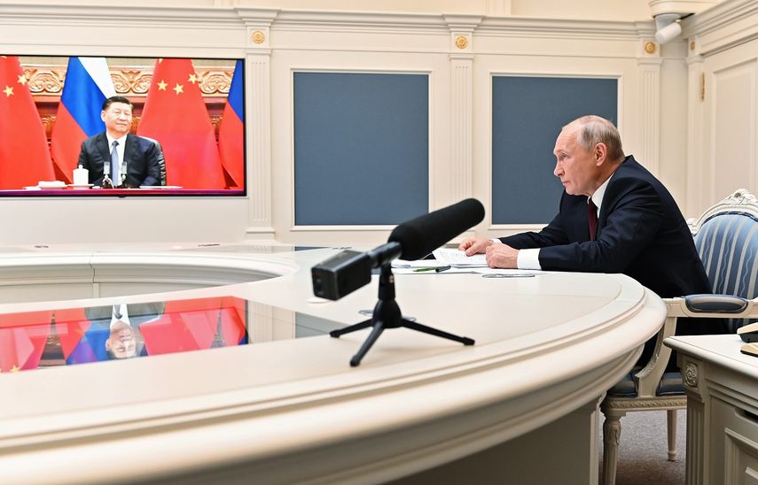 Los presidentes de Rusia y China en una videollamada.&nbsp;
