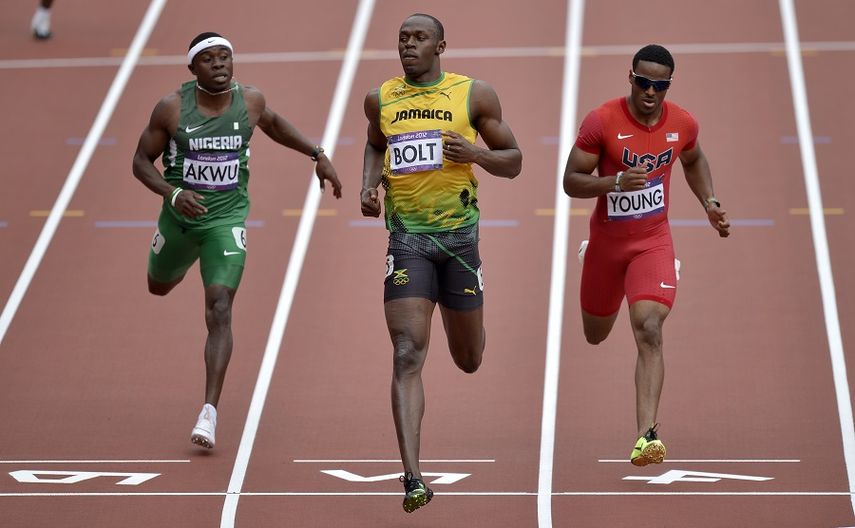 Bolt defendió con éxito en Pekín sus títulos mundiales de 100, 200 y 4x100 metros. (ARCHIVO)