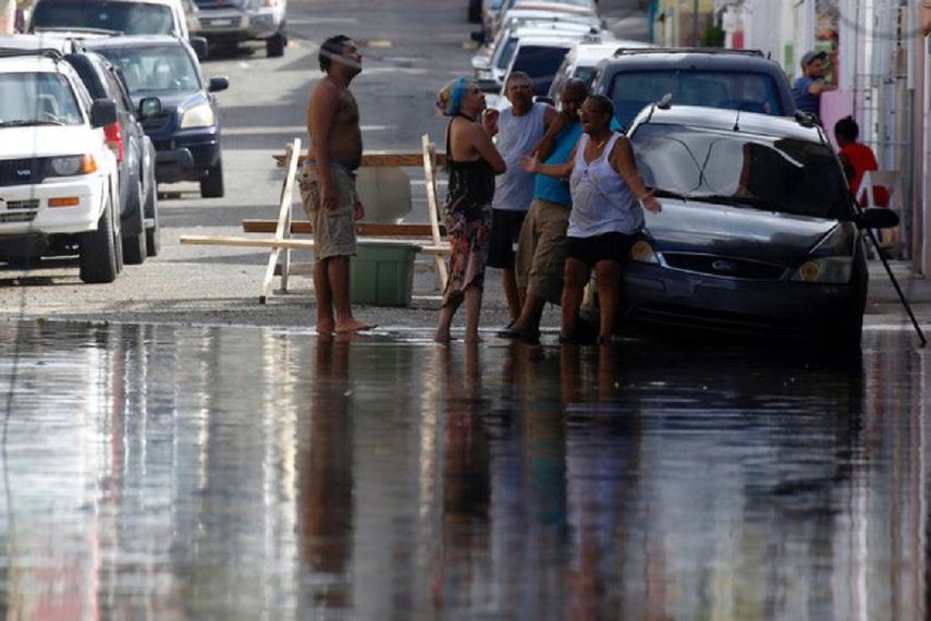 Una calle inundada en el sector Playita, en Santasucre, después del paso del Huracán María por San Juan (Puerto&nbsp;Rico). &nbsp;