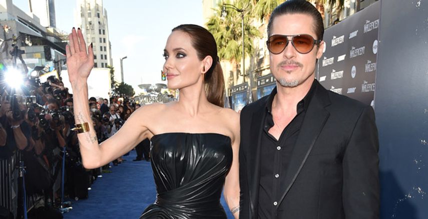 El atacante fue apartado de la escena con las manos esposadas. En la foto, Angelina Jolie y Brad Pitt en la entrada a la sala de cine El Capitán de Hollywood. (AP)