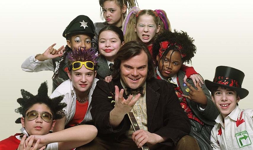 El actor Jack Black y los niños que estelarizaron School of Rock. (CORTESÍA). 