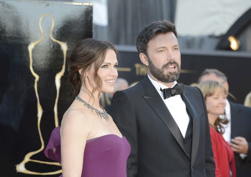 Jennifer Garner y Ben Affleck en tiempos felices como pareja durante la gala de los premios Oscar, en 2013.