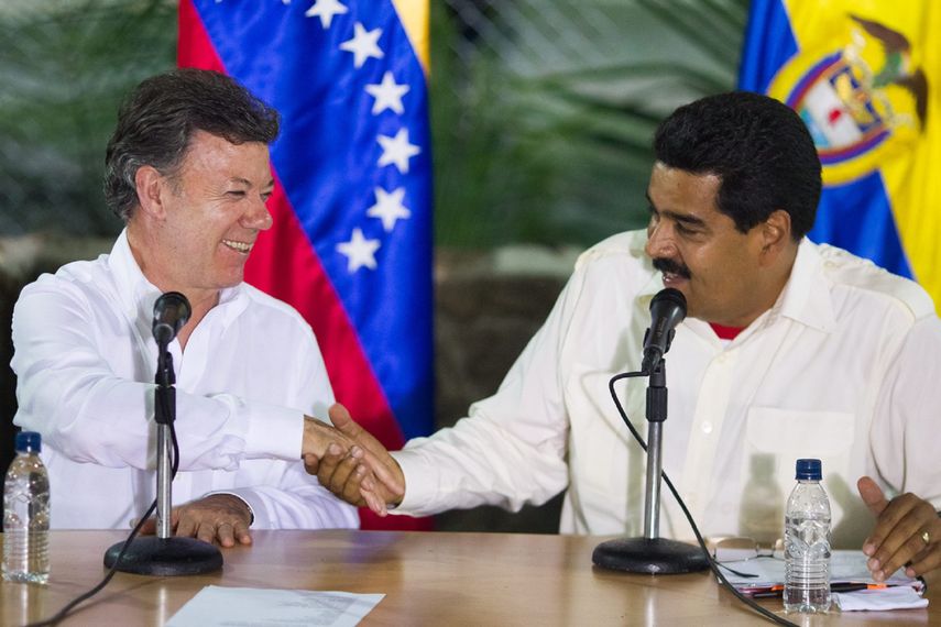 Santos había expresado antes su seria preocupación por el anuncio del  presidente Nicolás Maduro sobre un plan para expandir la Milicia  Bolivariana armando a miles de civiles
