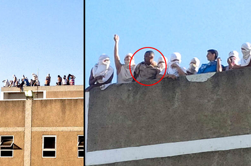 Funcionarios de la división anti motín permanecen alertas en los alrededores de la sede policial. Foto vía Twitter.