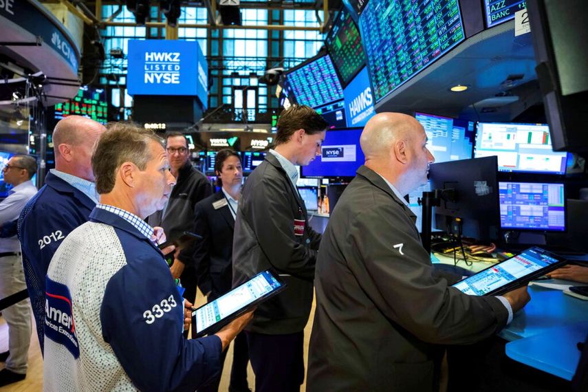 Agentes de la Bolsa de Nueva York en una sesión de trabajo.