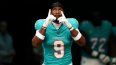 Jonnu Smith celebra una anotacion conseguida por los Dolphins de Miami