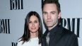 Courteney Cox y Johnny McDaid asisten a la 64 edición de los BMI Pop Awards.