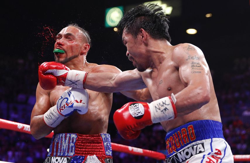 Dos jueces otorgaron tarjetas de 115-112 para Pacquiao, mientras que Glenn Feldman dio una puntuación de 114-113 para Thurman.&nbsp;