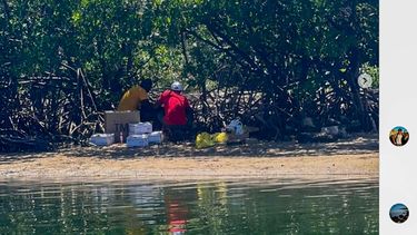 Captura de Instagram de la cuenta Virginia Key Outdoor Center que muestra a un par de hombres supuestamente realizando sacrificio de animales en Virgina Key.
