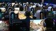 Los visitantes juegan al videojuego Arena Breakout: Infinite durante la jornada de prensa en la feria de videojuegos Gamescom, que se celebra en Colonia, Alemania occidental, el 21 de agosto de 2024.&nbsp; 