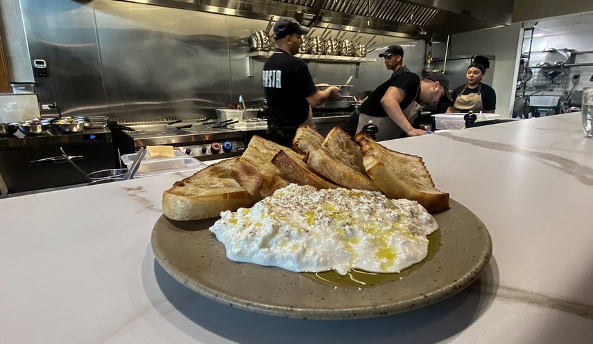 Stracciatella with sourdough bread, Pasta, Miami.