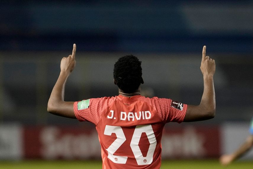 Jonathan David, de Canadá festeja tras anotar ante El Salvador en un duelo de la eliminatoria mundialista, disputado el miércoles 2 de febrero de 2022