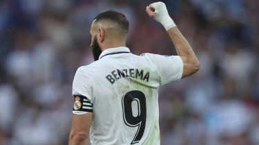 El delantero francés Karim Benzema celebra un gol anotado con el Real Madrid.