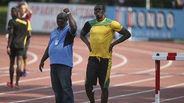 Glen Mills (izquierda) durante un entrenamiento en Moscú para el Campeonato Mundial de Atletismo en 2013