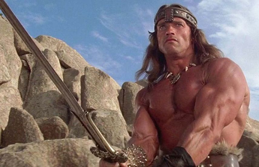 La relación entre Schwarzenegger y Milius se remonta a principios de los 80, cuando el cineasta le dio la oportunidad de protagonizar Conan, el Bárbaro en 1982, que Milius co-dirigió y escribió junto a Oliver Stone.