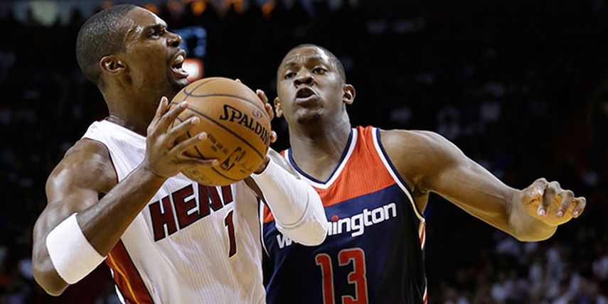 Chris Bosh sacó la cara en el día inaugural en el downtown de Miami