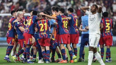 Los jugadores del Barcelona celebran tras ganar la final de la Supercopa de España entre el FC Barcelona y el Real Madrid en el Estadio Rey Abdullah en Yeddah el 11 de enero de 2026.&nbsp;