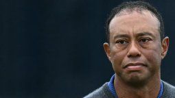 El golfista estadounidense Tiger Woods reacciona durante la primera ronda del día inaugural en el British Open Golf Championship, el 18 de julio de 2024. El golfista estadounidense Tiger Woods reacciona durante la primera ronda del día inaugural en el British Open Golf Championship, el 18 de julio de 2024.