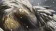 En esta ilustración, proporcionada por la Universidad de Vigo y el University College de Londres, se muestra un dromeosaurio incubando sus huevos mientras cae la nieve.&nbsp;