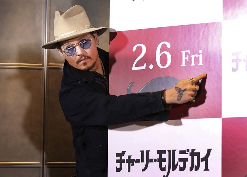 El actor estadounidense Johnny Depp posa durante una conferencia de prensa para promover su más reciente película, Mortdecai. (AP)