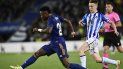 El extremo brasileño Vinícius Júnior, centro, del Real Madrid, avanza con el balón ante la marca del defensor Aihen Muñoz, de la Real Sociedad, en duelo de la Liga en el estadio Reale Arena de San Sebastián, España, el sábado 4 de diciembre de 2021. El extremo brasileño Vinícius Júnior, centro, del Real Madrid, avanza con el balón ante la marca del defensor Aihen Muñoz, de la Real Sociedad, en duelo de la Liga en el estadio Reale Arena de San Sebastián, España, el sábado 4 de diciembre de 2021.