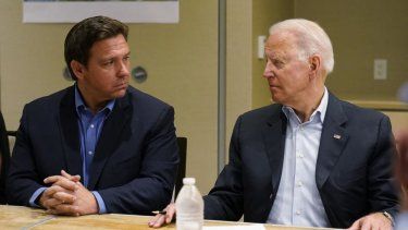 El gobernador de Florida, Ron DeSantis, y el presidente de EEUU, Joe Biden.