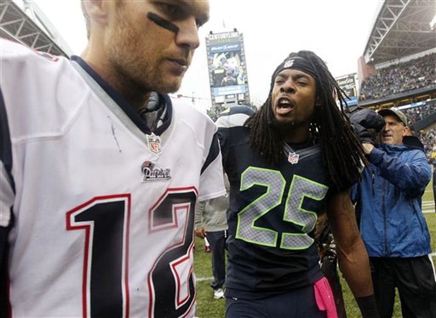 Richard Sherman (derecha) ha criticado a Tom Brady. (AP)