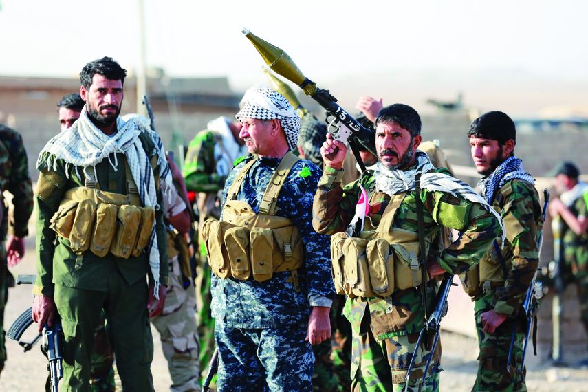 Miembros de la milicia chiíta iraquí durante acciones contra el Estado Islámico en Mosul.