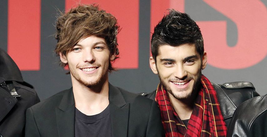 Los dos miembros de One Direction que aparecen en el video filtrado. (AP)