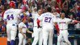 La delegación de República Dominicana celebra tras anotar en cuartos de final contra Corea del Sur