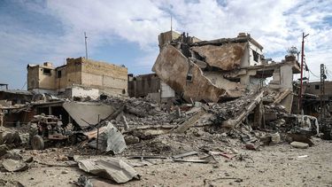 Edificios destruidos tras un bombardeo al este de Guta, en Duma (Siria).