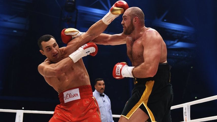 Klitschko (izquierda) tendrá su revancha el 9 de julio contra Fury (derecha). ARCHIVO