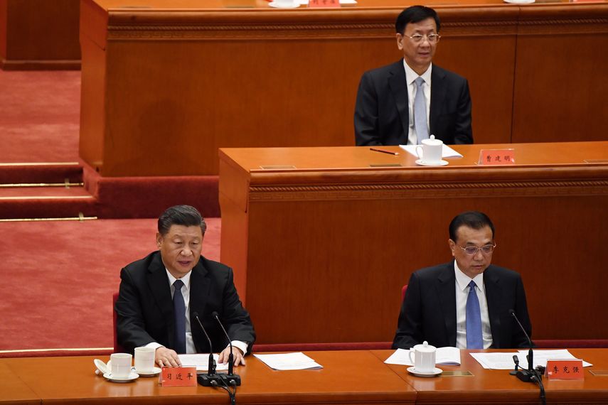 Xi Jinping, el líder del régimen comunista de China (izq.).