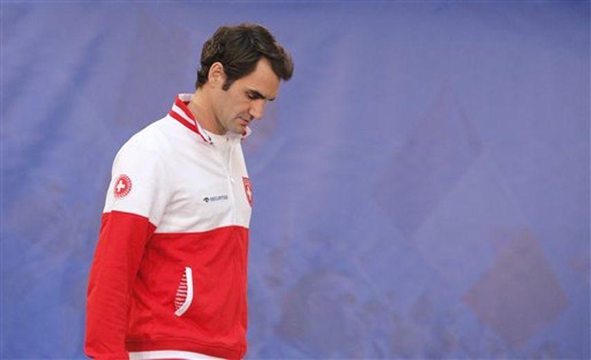 Federer dijo no haber sentido molestias durante sus prácticas de la mañana del jueves. (AP)