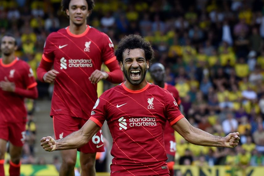 El delantero de Liverpool Mohamed Salah celebra tras anotar el tercer gol de su equipo en el partido de la Liga Premier inglesa contra Norwich