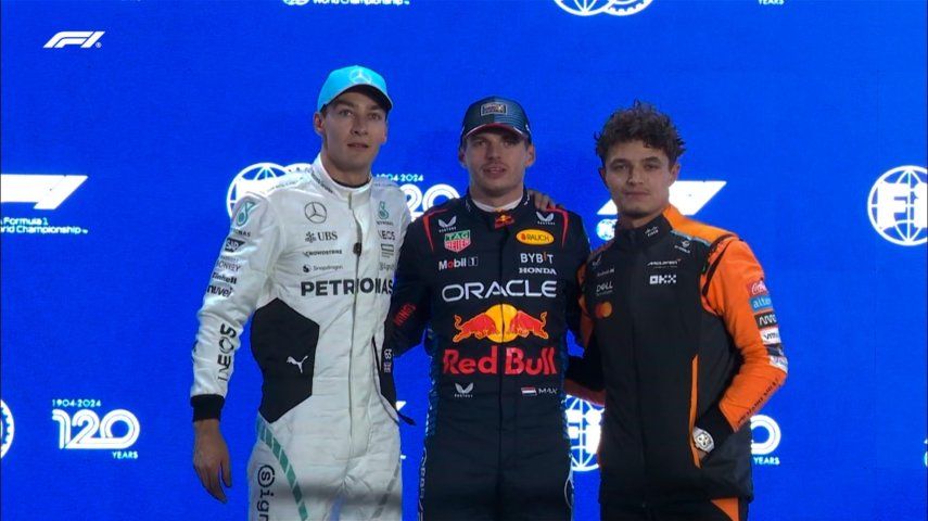 El campeón Max Verstappen posa junto a George Russell (izquierda) y Lando Norris (derecha), quienes serán los tres primeros en salir en el Gran Premio de Catar en la Fórmula 1