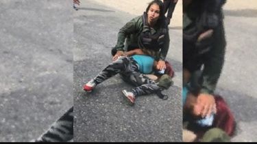 La profesional del Derecho fue detenida en el destacamento 121 de la GNB, debido a que la funcionario que la agredi&oacute; la acusa de querer despojarla de su arma de reglamento