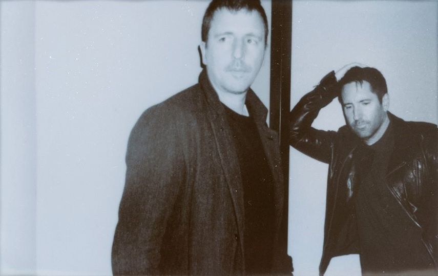 Los músicos Atticus Ross y Trent Reznor.