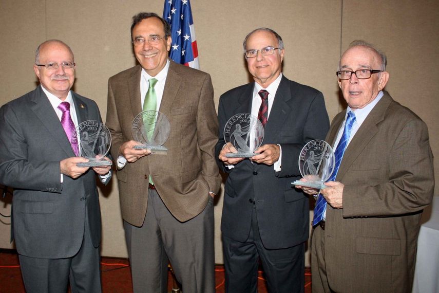Eduardo Padrón, Carlos Alberto Montaner, ManuelCereijo y Jaime Suchlicki.