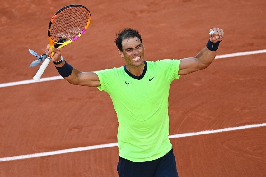 El español Rafael Nadal celebra después de ganar contra el italiano Jannik Sinner en octavos de final del Roland Garros en París el 7 de junio de 2021 &nbsp; &nbsp;