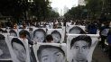 Estudiantes normalistas muestran las fotografías de los 43 estudiantes desaparecidos de la Escuela Normal Rural de Ayotzinapa al acompañar a los familiares en una marcha en el sexto aniversario de la desaparición de los 43 estudiantes, en Ciudad de México, el sábado 26 de septiembre de 2020. () Estudiantes normalistas muestran las fotografías de los 43 estudiantes desaparecidos de la Escuela Normal Rural de Ayotzinapa al acompañar a los familiares en una marcha en el sexto aniversario de la desaparición de los 43 estudiantes, en Ciudad de México, el sábado 26 de septiembre de 2020. ()