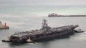 El portaaviones estadounidense USS Ronald Reagan sale de un puerto en Busan, Corea del Sur, el lunes 26 de septiembre de 2022. El portaaviones estadounidense y su grupo de combate iniciaron maniobras con buques surcoreanos ante la costa este de la Península de Corea en su primer ejercicio de esta clase en cinco años. 