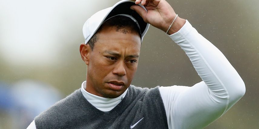 Woods durante el torneo de Dubai cuando tuvo que retirarse aquejado por dolores en la espalda.