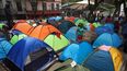Migrantes haitianos acampan en la plaza Giordano Bruno, el 18 de mayo de 2023, en la colonia Juárez, de Ciudad de México.