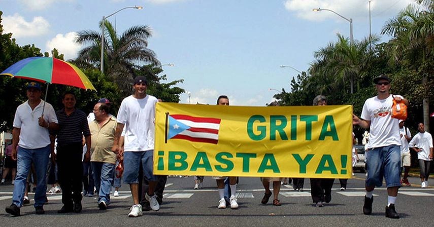 Puertorriqueños participan en la marcha Puerto Rico grita. (EFE/ARCHIVO)