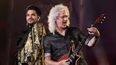 Adam Lambert y Brian May de Queen tocan en el festival Global en Nueva York.