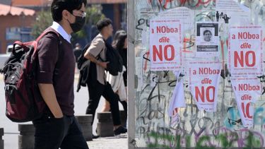 Un estudiante pasa junto a una parada de autobús con carteles en contra del referendo propuesto por el presidente de Ecuador, Daniel Noboa, en el norte de Quito, el 11 de noviembre de 2025.&nbsp;