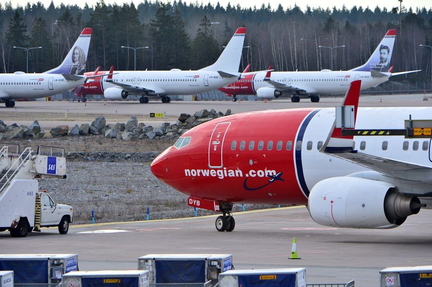 Aviones&nbsp;Boeing&nbsp;737-800 de Norwegian Airlines permanecen aparcados en el aeropuerto de Arlanda en Estocolmo (Suecia) el 5 de marzo de 2019.