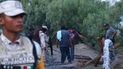 Voluntarios drenan agua de una mina de carbón inundada donde varios mineros quedaron atrapados el jueves 4 de agosto de 2022, en Sabinas, en el estado mexicano de Coahuila. 