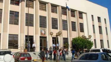 Un grupo de reporteros son vistos en las inmediaciones del Palacio de Justicia de República Dominicana.